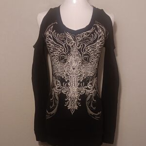 NWT. Black Cold Shoulder Long Sleeve Top with Intricate Design Front And Back